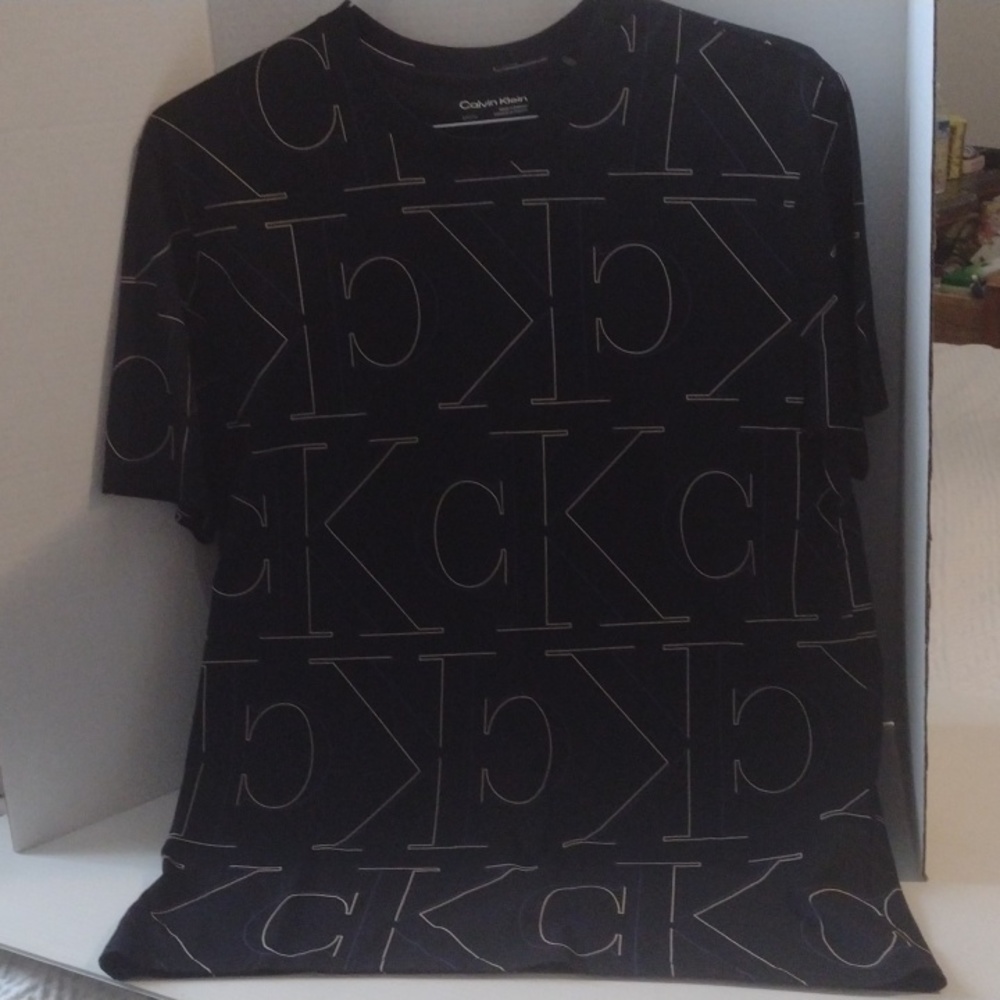 2 men's small pullover shirts new. Kenneth Cole and Calvin Klein